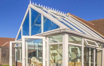 conservatory roof insulation costs Clay Common